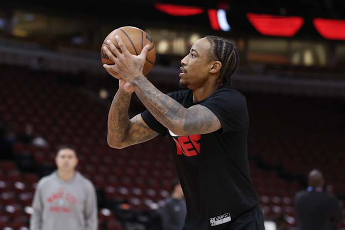Chicago Bulls forward DeMar DeRozan (11) warms up before a basketball game against the Charlotte Hornets at United Center.